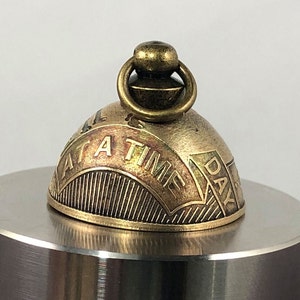 Easy Does It - One Day at a Time.  Gremlin, or Angel Bell. AKA a Guardian Bell- Made With a Single Sobriety Token