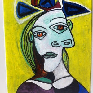 Hommage à Picasso (65)  en miniature: Head of a woman with a blue hat with  red ribbon