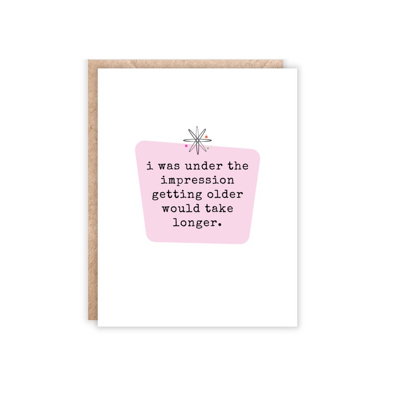White card with pink center. I was under the impression getting older would take longer card. Portrait size.