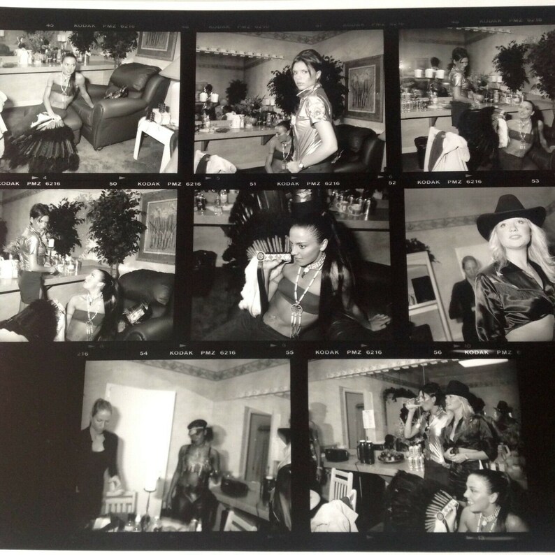 May include: A black and white photo contact sheet with multiple images of people in various poses. The images are arranged in a grid pattern and labeled with "Kodak PMZ 6210" and "Kodak PMZ 6216".