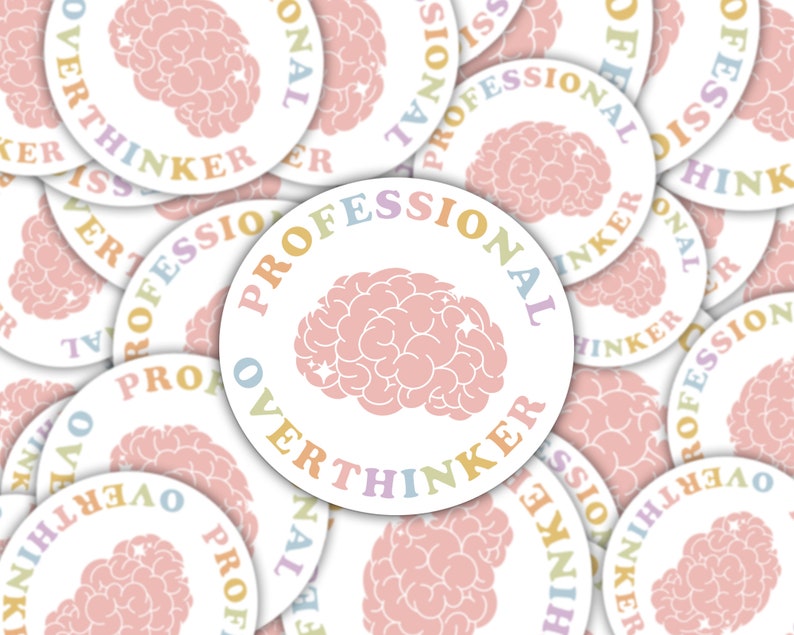 May include: A collection of white, round stickers with a pink brain graphic. The stickers have the words "PROFESSIONAL OVERTHINKER" in a rainbow of pastel colors. The brain graphic is also pink.