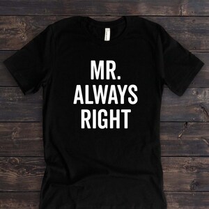 May include: Black t-shirt with white text that reads "MR. ALWAYS RIGHT".