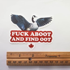 May include: A sticker set featuring a Canada goose with outstretched wings, a red and white text that reads "FUCK ABOOT AND FIND OOT", and a small maple leaf. The ruler shows inches.