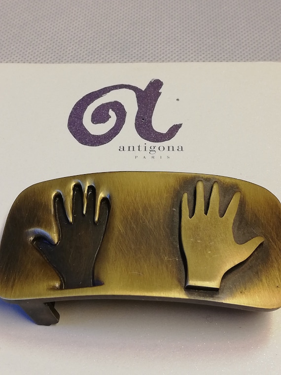 Antigona hands intaglio and relief pattern belt bu