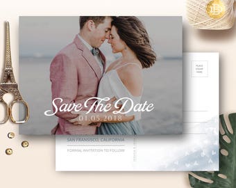 May include: Save the Date postcard featuring a photograph of a couple embracing on a beach. The text reads "Save The Date 01.05.2018 San Francisco, California Formal Invitation to Follow".