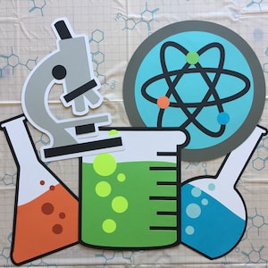 May include: A set of science-themed paper cutouts, including a microscope, a beaker, two flasks, and an atom. The beaker is filled with green liquid and has yellow bubbles. The flasks are filled with orange and blue liquids, respectively, and also have bubbles. The atom is surrounded by a gray circle and has a blue background.