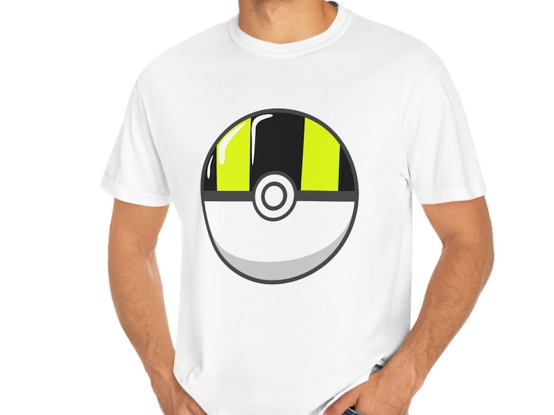 May include: A white t-shirt with a black and yellow Poke Ball graphic.