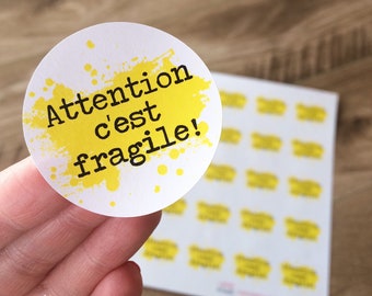 Autocollants en papier "Attention c'est fragile" avec un splash d'aquarelle jaune