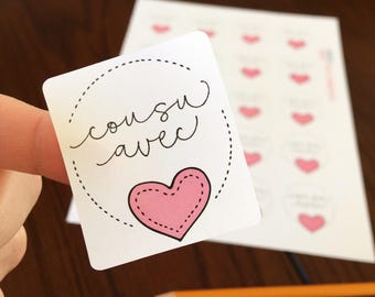 Stickers "Cousu avec amour" with a heart