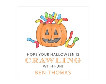 May include: A watercolor illustration features an orange jack-o'-lantern filled with colorful gummy worms. The text reads, "HOPE YOUR HALLOWEEN IS CRAWLING WITH FUN!" and "BEN THOMAS" in an orange font. The design is on a white background.