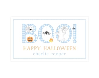 May include: A rectangular card with a light blue gingham pattern spelling "BOO!" with Halloween-themed illustrations. The card includes a jack-o'-lantern, spiders, a ghost, and candy corn. The text "HAPPY HALLOWEEN" and a name are below.
