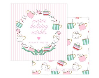 May include: A square card with a light pink striped background featuring a wreath of illustrated mugs filled with hot cocoa and marshmallows. The text reads warm holiday wishes and GRACE SMITH. A matching pattern of mugs is visible on the side.