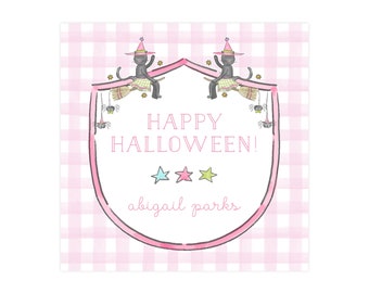 May include: A square, pink and white gingham patterned Halloween-themed design. The design features a pink shield shape with the words "HAPPY HALLOWEEN!" and the name "abigail parks". Two black cats wearing witch hats ride brooms, with stars and spider decorations.