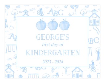 May include: A blue and white printable sign with a schoolhouse theme. It says "GEORGE'S first day of KINDERGARTEN 2023-2024" with three blue apples.