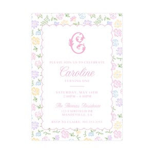 May include: A pink and white floral patterned invitation with a pink letter "C" in a decorative font. The invitation reads "Please join us to celebrate Caroline turning one. Saturday, May 14th 2:00PM-4:00PM The Thomas Residence 123 Fairfield Dr Mandeville, LA RSVP to Claire: 985-555-5555"