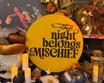 Retro-Inspired "The Night Belongs to Mischief" Round Sign