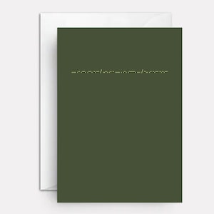 May include: A dark green card with a line of small white dots across the center.