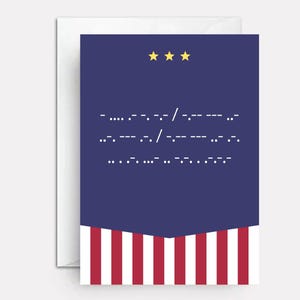 May include: A greeting card with a dark blue upper section featuring three yellow stars and white Morse code text. The lower section displays vertical red and white stripes. The card is rectangular with a clean, flat design and a white envelope behind it.