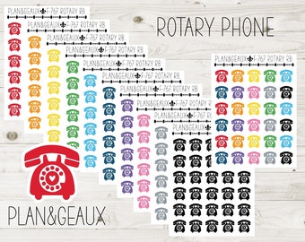 May include: A sheet of colorful rotary phone stickers with a larger red rotary phone sticker in the center. The stickers are arranged in rows and columns. The text "PLAN&GEAUX" is printed at the bottom of the sheet. The text "ROTARY PHONE" is printed at the top of the sheet.
