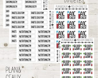 May include: A set of stickers for a diabetes tracker or planner. The stickers are white with black text and include terms like "diabetes educator", "nutritionist", "A1C check", and "blood work".
