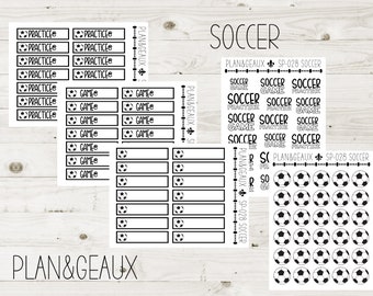 May include: A set of black and white soccer-themed planner stickers. The stickers feature the words "Soccer", "Game", and "Practice" along with soccer balls. The stickers are designed for use in a planner or journal.