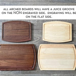 four different types of wooden cutting boards, each with a unique shape and size, arranged on a wooden surface.