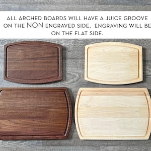four different types of wooden cutting boards, each with a unique shape and size, arranged on a wooden surface.