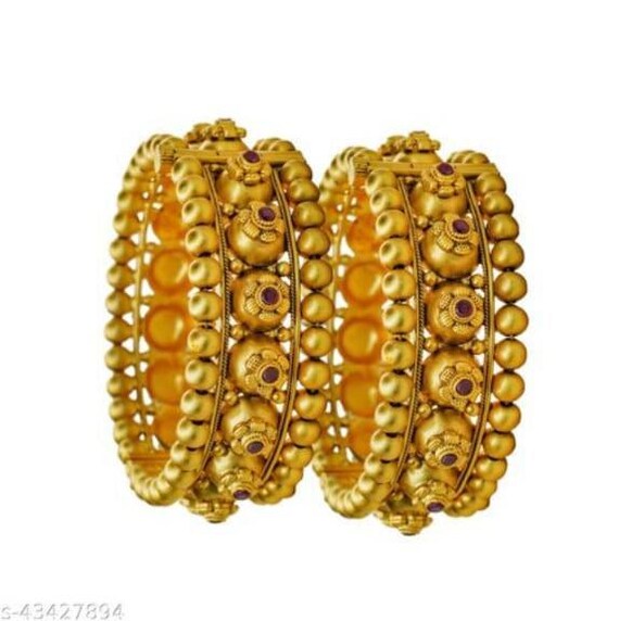 Gold bangles sales south indian designs