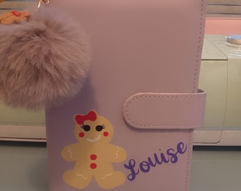 Design your own A6 binder including 6 trackers of your themed choice and pompom keyring