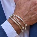 Set of 3, Four Knot, Three Strand Sterling Silver Adjustable Elephant Hair Bangles product logo