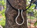 Sterling Silver and Leather Men's Ring Holder Necklace product logo