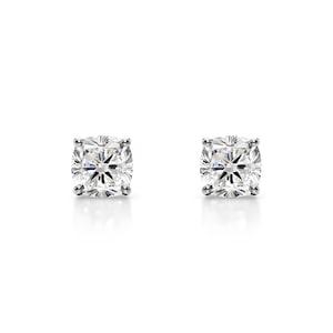 May include: A pair of square-cut diamond stud earrings. Each earring features a brilliant, clear diamond set in a silver or white gold setting. The diamonds are displayed against a white background, highlighting their sparkle.