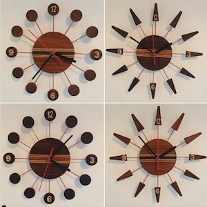 May include: Four different styles of wooden clocks with a modern design. Each clock has a circular face with Roman numeral markings and a unique set of hands. The clocks have a wood grain finish and are available in different colours.