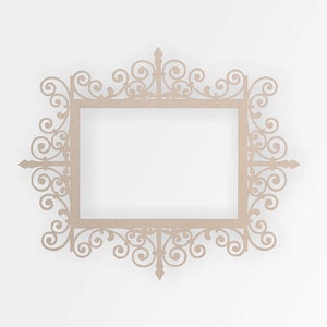 May include: A decorative, ornate, light brown wooden frame with a scrolled design. The frame is empty and ready for a picture or artwork.