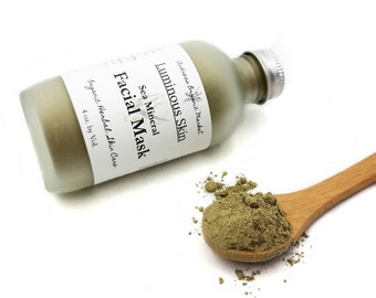 May include: A glass jar of green facial mask powder with the label "Luminous Skin Sea Mineral Facial Mask Organic Herbal Skin Care 4 oz. by Vol."  The powder is also shown in a wooden spoon.