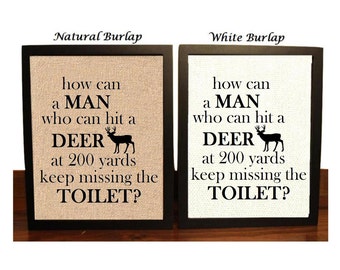 Funny Deer Bathroom Humor Burlap Print | Deer Hunting | Deer Hunter | How can a Man that can hit a Deer at 200 yards keep missing the Toilet