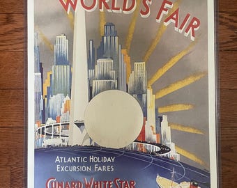 May include: A vintage travel poster advertising a trip to the 1939 New York World's Fair on the Cunard White Star liner, The Empire State. The poster features a stylized illustration of the New York City skyline with the Trylon and Perisphere in the foreground.