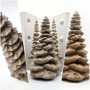 May include: A silicone mold for making three small, detailed, brown, ceramic Christmas trees. The mold is white and has a smooth surface.