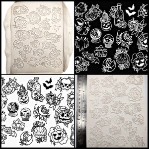 May include: A set of three silicone molds for making Halloween-themed decorations. The molds feature various designs, including pumpkins, bats, skulls, and spiderwebs. The molds are made of a flexible, durable silicone material and are easy to clean.