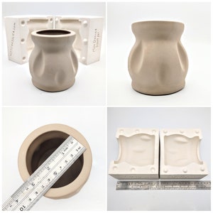 May include: Two white silicone molds for making a ceramic vase. The vase is a light brown color and has a rounded, bulbous shape with a slightly flared opening. The molds are labeled "Mini Denced" and "Stash Jar".