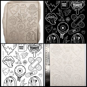 May include: A set of 16 silicone molds for making zombie-themed decorations. The molds feature various designs, including a heart, a brain, a hand, an eye, a tongue, a bandage, a fly, a bone, and a tombstone. The molds are white and have a smooth surface.