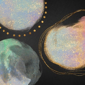 May include: Abstract watercolor painting with three circular shapes on a black background. The shapes are filled with iridescent colors and glitter, creating a celestial or galaxy-like effect. The shapes are outlined with gold glitter.