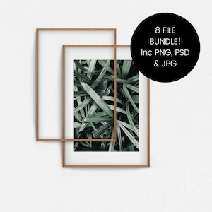 Könnte beinhalten: Ein gerahmter Druck einer Nahaufnahme von grünen Blättern. Der Rahmen ist aus Holz und hat eine natürliche Oberfläche.