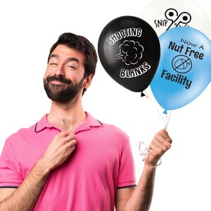 May include: A set of three balloons including a black balloon with the text 'SHOOTING BLANKS' and a cloud graphic, a light blue balloon with the text 'Now A Nut Free Facility' and a crossed-out nut icon, and a white balloon with 'SNIP' text.