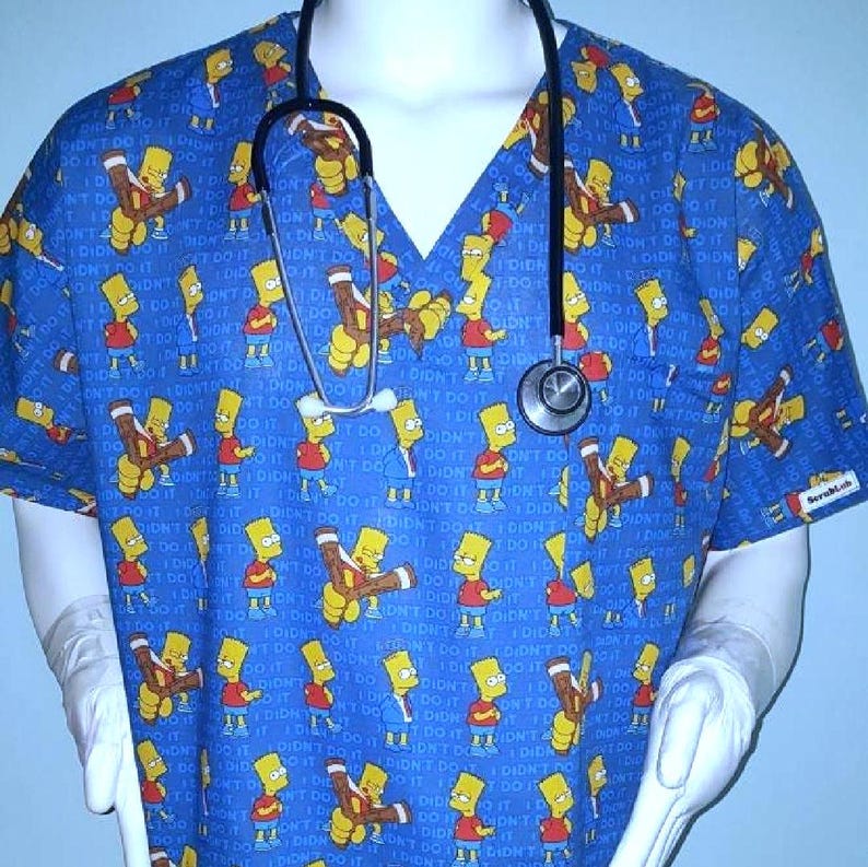 May include: A blue medical scrub top with a v-neck collar. The scrub top has a repeating pattern of the Simpsons character Bart Simpson holding a wooden stick and saying 'I didn't do it' in yellow text. The scrub top has a stethoscope hanging from the neck.