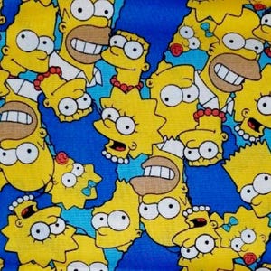 May include: A blue background with a repeating pattern of yellow cartoon faces. The faces are of various characters from the Simpsons television show, including Homer, Marge, Bart, Lisa, and Maggie. The characters are all smiling and have large eyes.