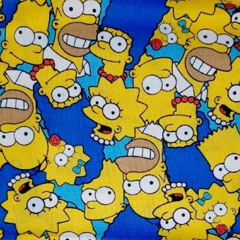 May include: A blue background with a repeating pattern of yellow cartoon faces. The faces are of various characters from the Simpsons television show, including Homer, Marge, Bart, Lisa, and Maggie. The characters are all smiling and have large eyes.