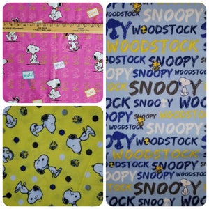 May include: A collage of three fabric swatches featuring a repeating pattern of Snoopy and Woodstock. The first swatch is pink with white outlines of Snoopy and Woodstock. The second swatch is yellow with black polka dots and a repeating pattern of Snoopy and Woodstock. The third swatch is blue with a repeating pattern of the words "Snoopy" and "Woodstock" in various colours.