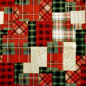 May include: A patchwork design featuring various plaid patterns in red, green, and white. The fabric is composed of rectangular and square patches, creating a textured, geometric composition. The overall theme is festive and decorative.