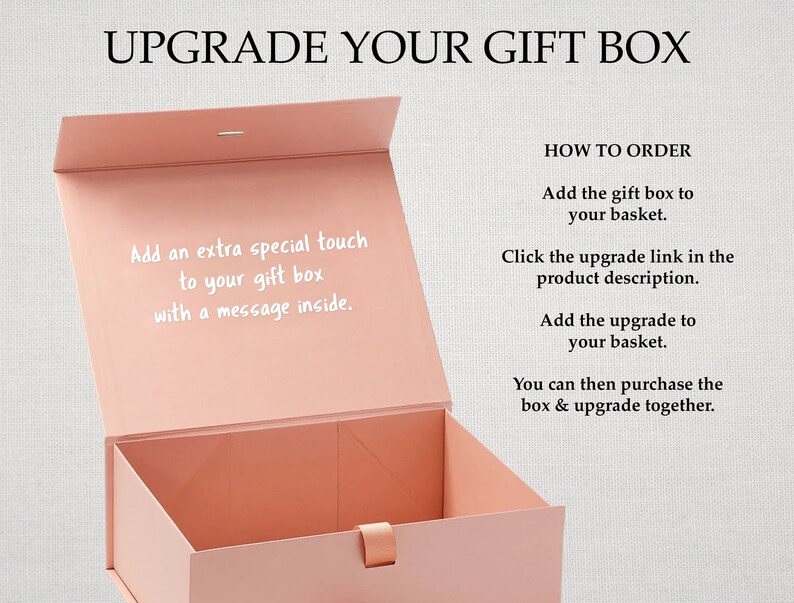 May include: A pink gift box with the text "Upgrade Your Gift Box" and instructions on how to add a personalized message inside the box.